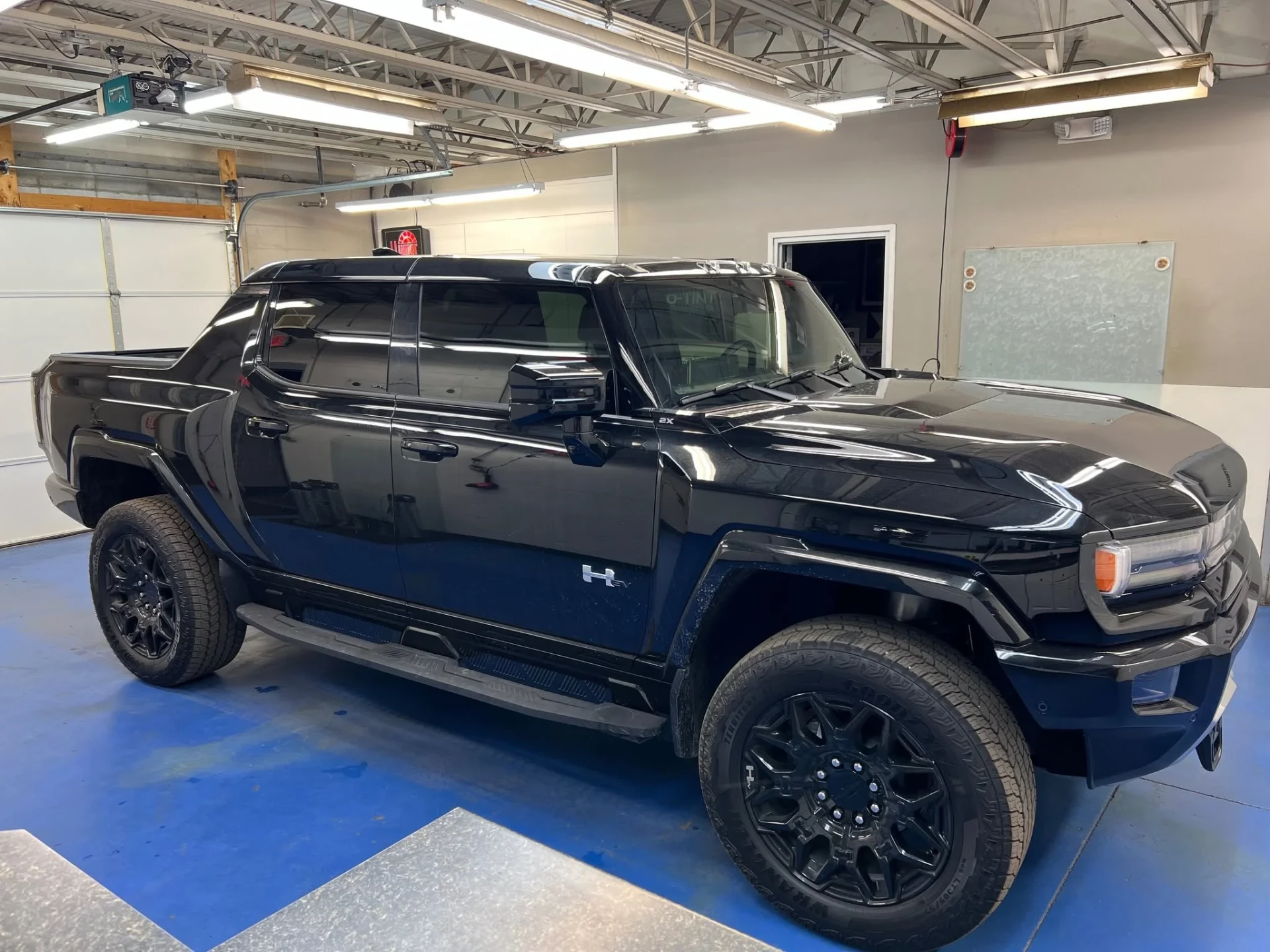 GMC Hummer EV with full tint
